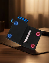 Load image into Gallery viewer, Black wallet with magnetic closure feature illustrated on a white background, branded &#39;Ozerlo&#39;.