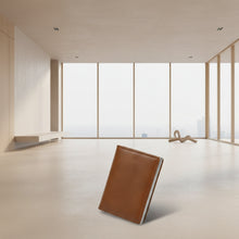 Load image into Gallery viewer, Brown wallet with card slots on a white background, featuring text about anti-theft protection.