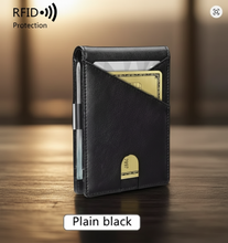 Load image into Gallery viewer, Black wallet with card holder and pen on a white background, featuring RFID protection.
