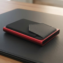 Load image into Gallery viewer, A red  Men &amp; Women Luxury Wallet by Ozerlo displayed with cards and cash, emphasizing its compact and slim design.