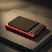 Load image into Gallery viewer, Red and black wallet on a white background